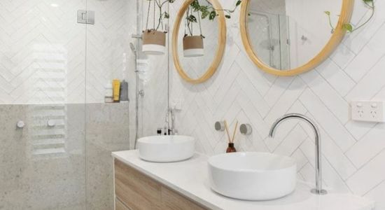 A modern bathroom renovation in Auckland featuring new plumbing and fixtures installed by Hydrofix Plumbing